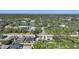 Wide aerial view showing the property and surroundings at 18395 Edgewater Dr, Port Charlotte, FL 33948