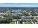 Wide aerial showcasing waterfront property with expansive views, desirable neighborhood at 18395 Edgewater Dr, Port Charlotte, FL 33948