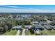 Wide aerial showcasing waterfront property with expansive views, desirable neighborhood at 18395 Edgewater Dr, Port Charlotte, FL 33948