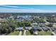 Wide aerial showcasing waterfront property with expansive views, desirable neighborhood at 18395 Edgewater Dr, Port Charlotte, FL 33948