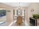 Kitchen nook with table for four, looking out to the pool area at 18395 Edgewater Dr, Port Charlotte, FL 33948