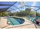 Relaxing pool and patio area with plenty of sunshine at 18395 Edgewater Dr, Port Charlotte, FL 33948