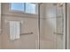 Bathroom with a walk-in shower and grab bars at 1848 Bobcat Trl, North Port, FL 34288