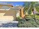 Front view of the house and driveway at 1848 Bobcat Trl, North Port, FL 34288