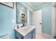 Simple bathroom with single vanity and built-in shelving at 192 Danforth S Dr, Port Charlotte, FL 33980