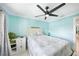 Light and airy bedroom with coastal-themed bedding at 192 Danforth S Dr, Port Charlotte, FL 33980