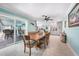 Bright dining area with view into kitchen and patio at 192 Danforth S Dr, Port Charlotte, FL 33980