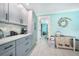 Modern kitchen with gray cabinets and marble countertops at 192 Danforth S Dr, Port Charlotte, FL 33980