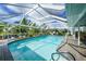 Inviting screened-in pool with plenty of sunshine at 192 Danforth S Dr, Port Charlotte, FL 33980