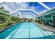 Large, refreshing pool with a screened enclosure at 192 Danforth S Dr, Port Charlotte, FL 33980