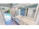 Bathroom with pool view and modern vanity at 220 Shreve St, Punta Gorda, FL 33950