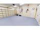 Spacious garage with painted floor and storage shelving at 220 Shreve St, Punta Gorda, FL 33950