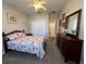 Spacious bedroom with double door closet and carpeted floor at 24157 Green Heron Dr # 27, Punta Gorda, FL 33980