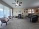 Relaxing living room with comfortable seating and lots of natural light at 24157 Green Heron Dr # 27, Punta Gorda, FL 33980