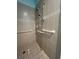 Large walk-in shower with grab bars and tiled walls at 24157 Green Heron Dr # 27, Punta Gorda, FL 33980