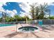 Hot tub and pool area providing a relaxing and refreshing oasis for residents with palm trees at 255 W End Dr # 4210, Punta Gorda, FL 33950