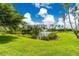 Scenic pond with a fountain, surrounded by lush greenery, providing a serene natural setting at 255 W End Dr # 4210, Punta Gorda, FL 33950