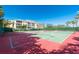 Tennis courts with manicured landscaping and views of the nearby property at 255 W End Dr # 4210, Punta Gorda, FL 33950