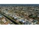 Aerial view of a single-Gathering home with a canal and surrounding houses at 269 Mariner Ln, Rotonda West, FL 33947