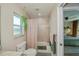 Clean bathroom with a shower/tub combo and updated vanity at 269 Mariner Ln, Rotonda West, FL 33947