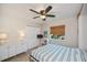 Well-lit bedroom featuring a comfortable bed and ample closet space at 269 Mariner Ln, Rotonda West, FL 33947