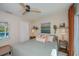 King bedroom with calming decor and view of the pool at 269 Mariner Ln, Rotonda West, FL 33947