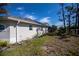 View of the house exterior and landscaping at 269 Mariner Ln, Rotonda West, FL 33947