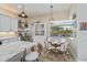 Bright kitchen nook with window seat overlooking the backyard at 269 Mariner Ln, Rotonda West, FL 33947