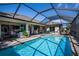 Inviting screened-in pool area with ample seating at 269 Mariner Ln, Rotonda West, FL 33947