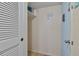 Small entryway with closet and door at 2763 Woodgate Ln # 206, Sarasota, FL 34231