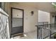 Condo building exterior with unit entrance at 2763 Woodgate Ln # 206, Sarasota, FL 34231