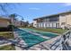 Community shuffleboard court with benches at 2763 Woodgate Ln # 206, Sarasota, FL 34231