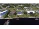 Single-story home with pool, situated on waterfront property at 3000 Peace River Dr, Punta Gorda, FL 33983