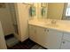 Clean bathroom with shower, vanity, and updated fixtures at 3000 Peace River Dr, Punta Gorda, FL 33983