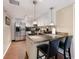 Modern kitchen with stainless steel appliances and white cabinets at 3006 Caring Way # 331, Port Charlotte, FL 33952