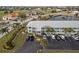 Aerial view of condo building with parking and landscaping at 3600 Bal Harbor Blvd # 1A, Punta Gorda, FL 33950