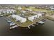 Aerial view of waterfront condos with private boat docks at 3600 Bal Harbor Blvd # 1A, Punta Gorda, FL 33950