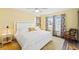 Bright bedroom with king-size bed and stylish decor at 3600 Bal Harbor Blvd # 1A, Punta Gorda, FL 33950