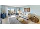 Bright living room with comfy furniture and water views at 3600 Bal Harbor Blvd # 1A, Punta Gorda, FL 33950