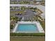 Community pool with surrounding patio and lounge chairs at 3600 Bal Harbor Blvd # 1A, Punta Gorda, FL 33950