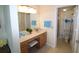 Main bathroom with double vanity and separate toilet area at 3627 Bal Harbor Blvd # 102, Punta Gorda, FL 33950