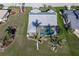 Aerial view of single-Gathering home with pool and golf course views at 3749 Bordeaux Dr, Punta Gorda, FL 33950