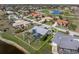 Aerial view of house with pool, near lake and golf course at 3749 Bordeaux Dr, Punta Gorda, FL 33950