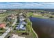 Aerial view of house near lake and golf course at 3749 Bordeaux Dr, Punta Gorda, FL 33950