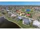 Aerial view of property near lake and golf course at 3749 Bordeaux Dr, Punta Gorda, FL 33950