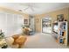 Relaxing bedroom with pool view and built-in shelving at 3749 Bordeaux Dr, Punta Gorda, FL 33950