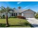 Beautiful home with a landscaped yard and attached two-car garage at 3749 Bordeaux Dr, Punta Gorda, FL 33950