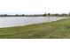 Peaceful lake view from the backyard at 3749 Bordeaux Dr, Punta Gorda, FL 33950