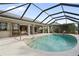 Spacious pool with screened enclosure and access to the house at 3749 Bordeaux Dr, Punta Gorda, FL 33950