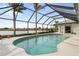 Relaxing screened-in pool area overlooking the lake at 3749 Bordeaux Dr, Punta Gorda, FL 33950